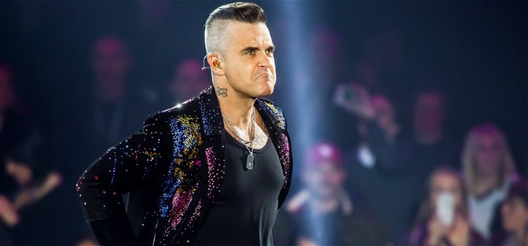 A fenegyerek Robbie Williams pillanatok alatt vesztette el a szüzességét – az édesanyja ágyában